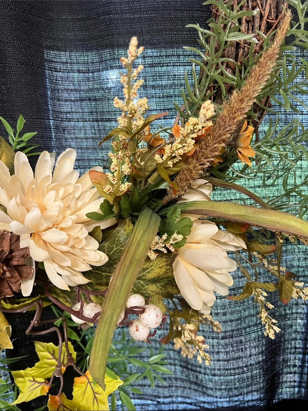Handcrafted Cream Floral Grapevine Wreath with Green Accents